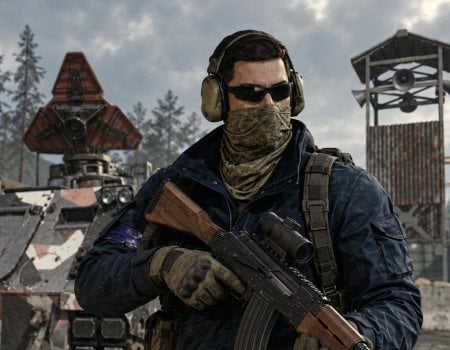A Pmc With an AK and Apc Behind Him Cover Image for Wardogs Leveling Guide